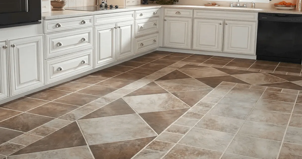 Kitchen with white cabinets and a professionally installed tile floor in Irvine, CA